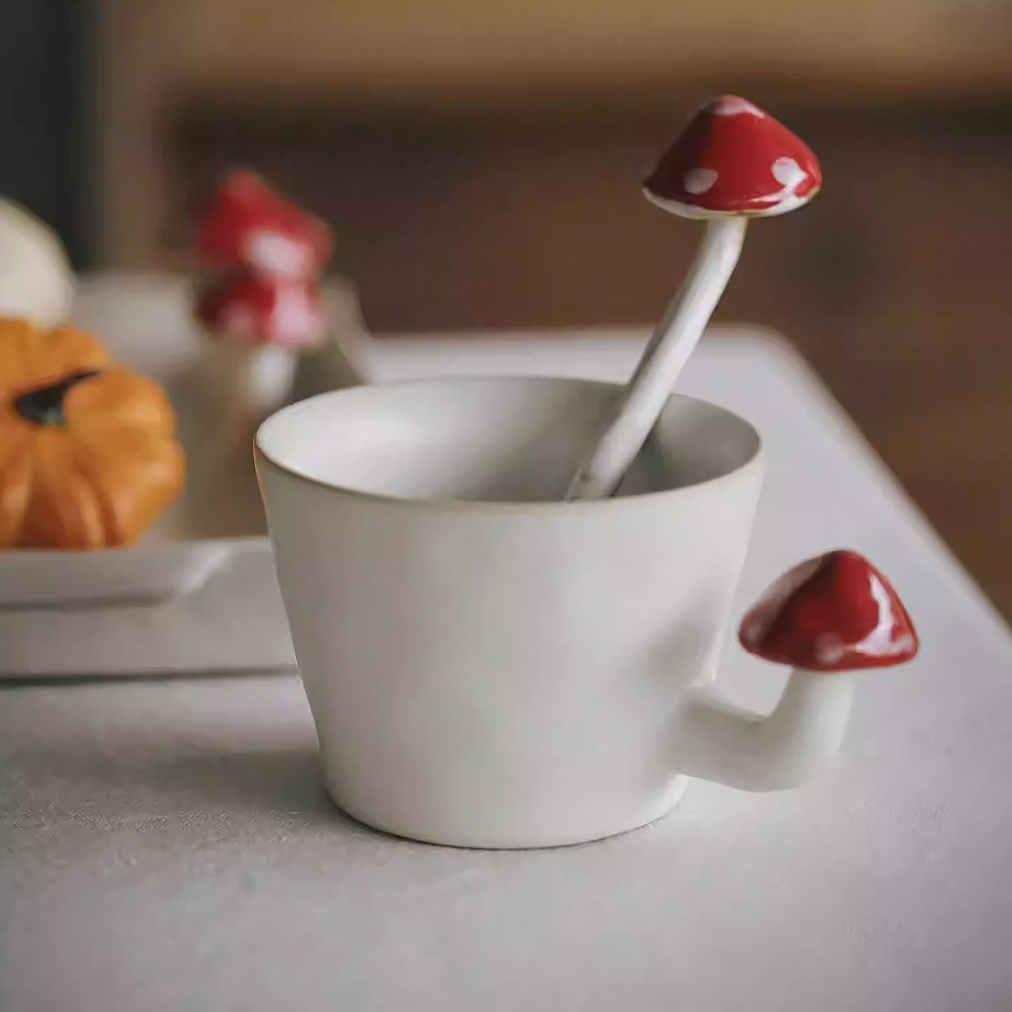 Handmade ceramic mug with mushroom handle