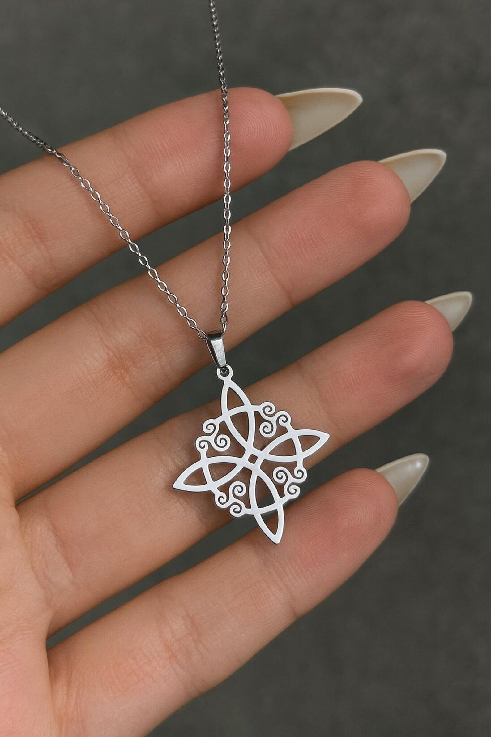 Steel necklace with a witch's knot