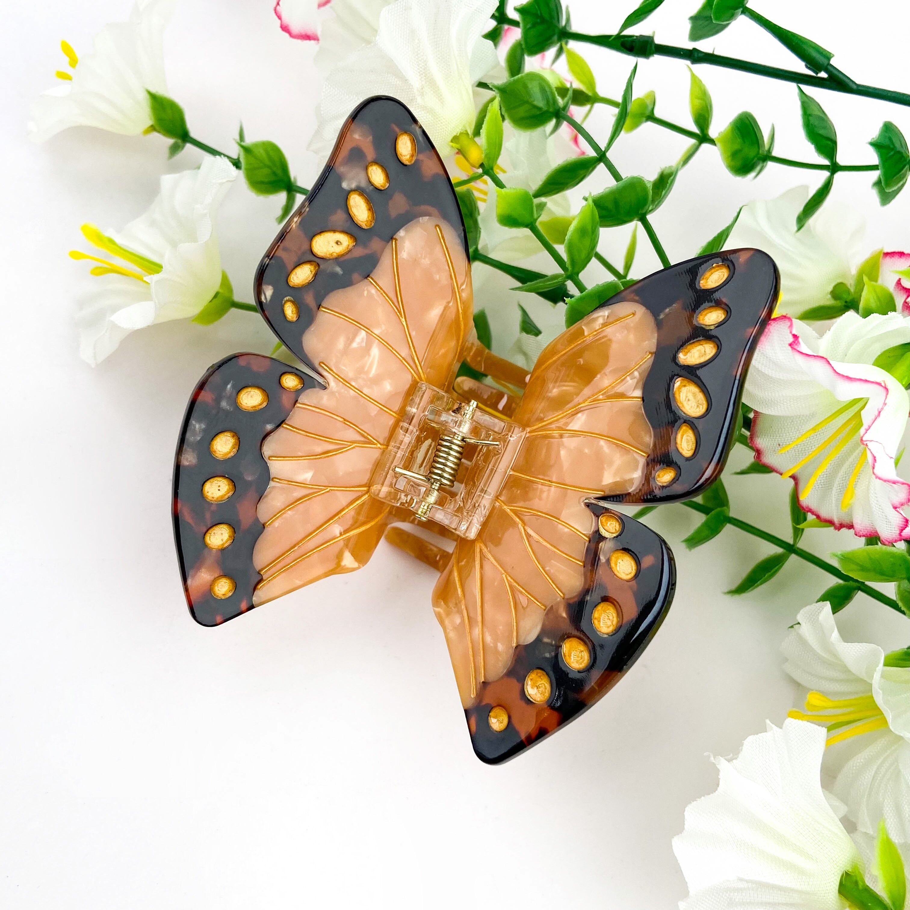 Haarspange mit braunem Monarchfalter