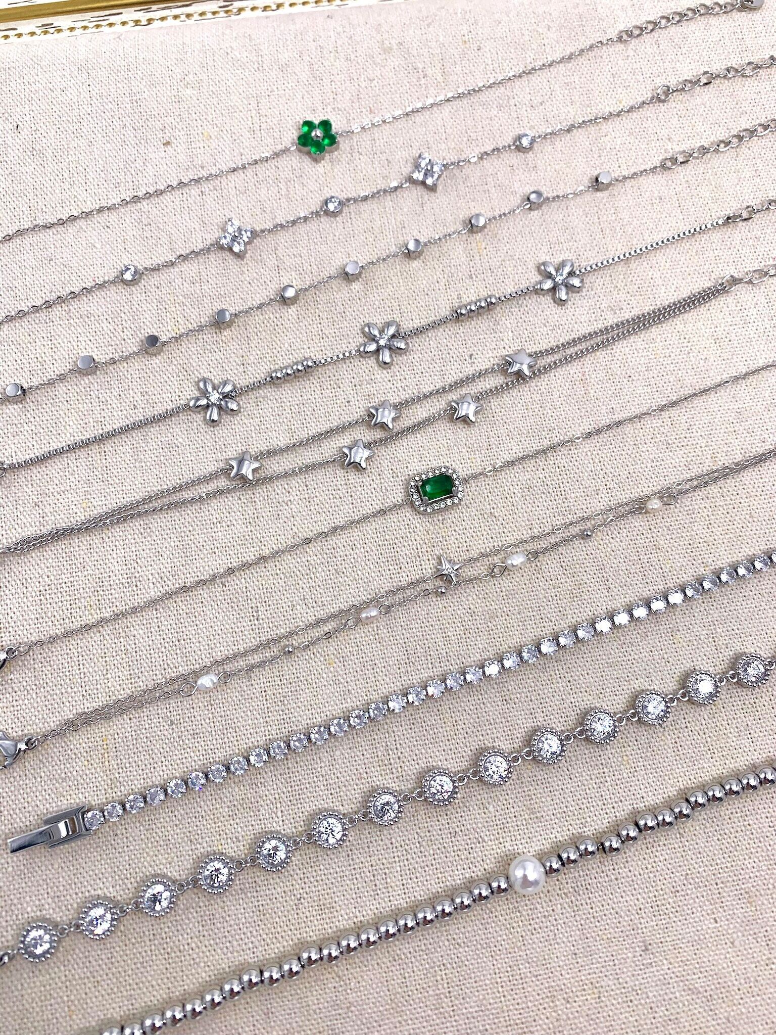 Juego de 10 pulseras de acero inoxidable sin expositor SET210