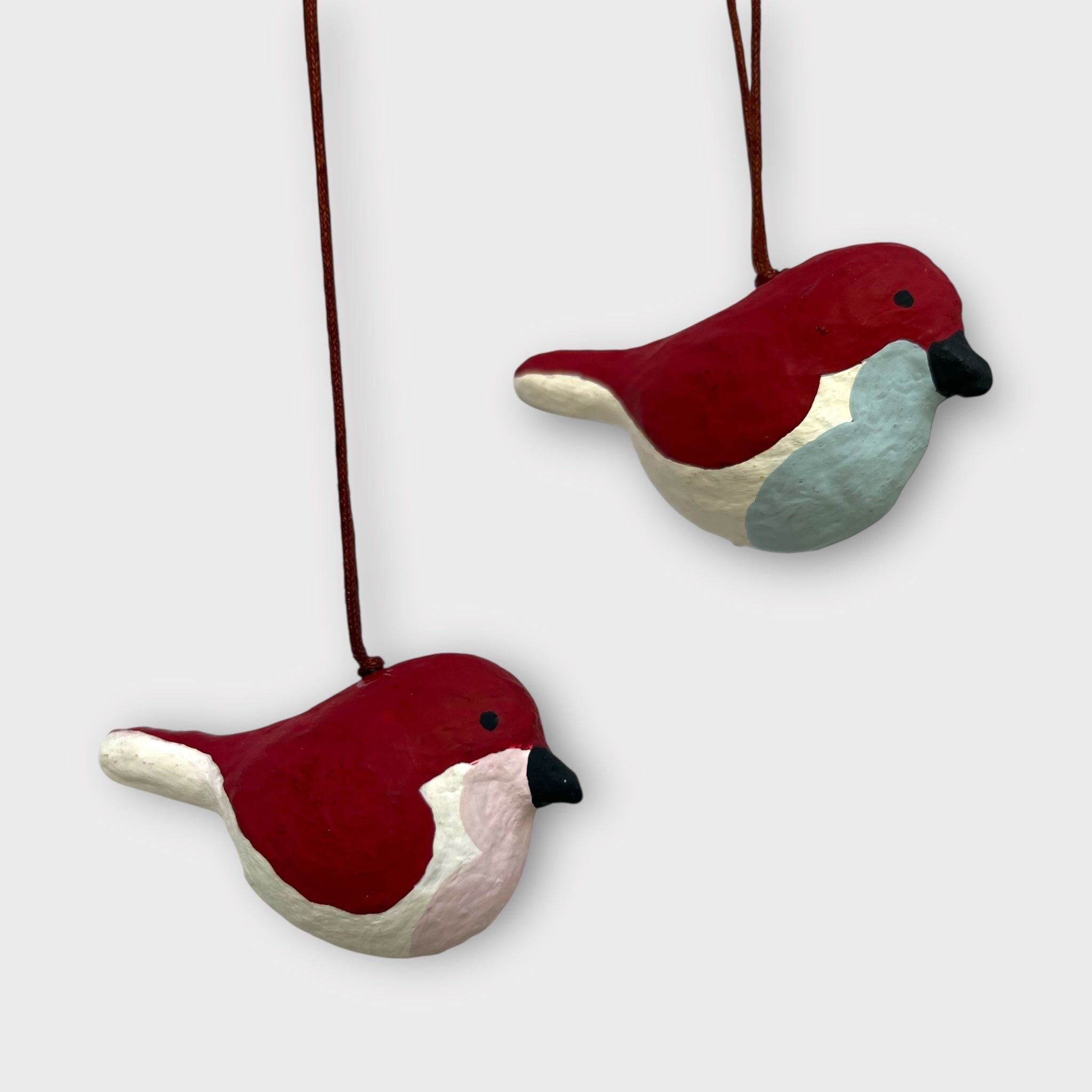 Vögel, rosa und hellblau