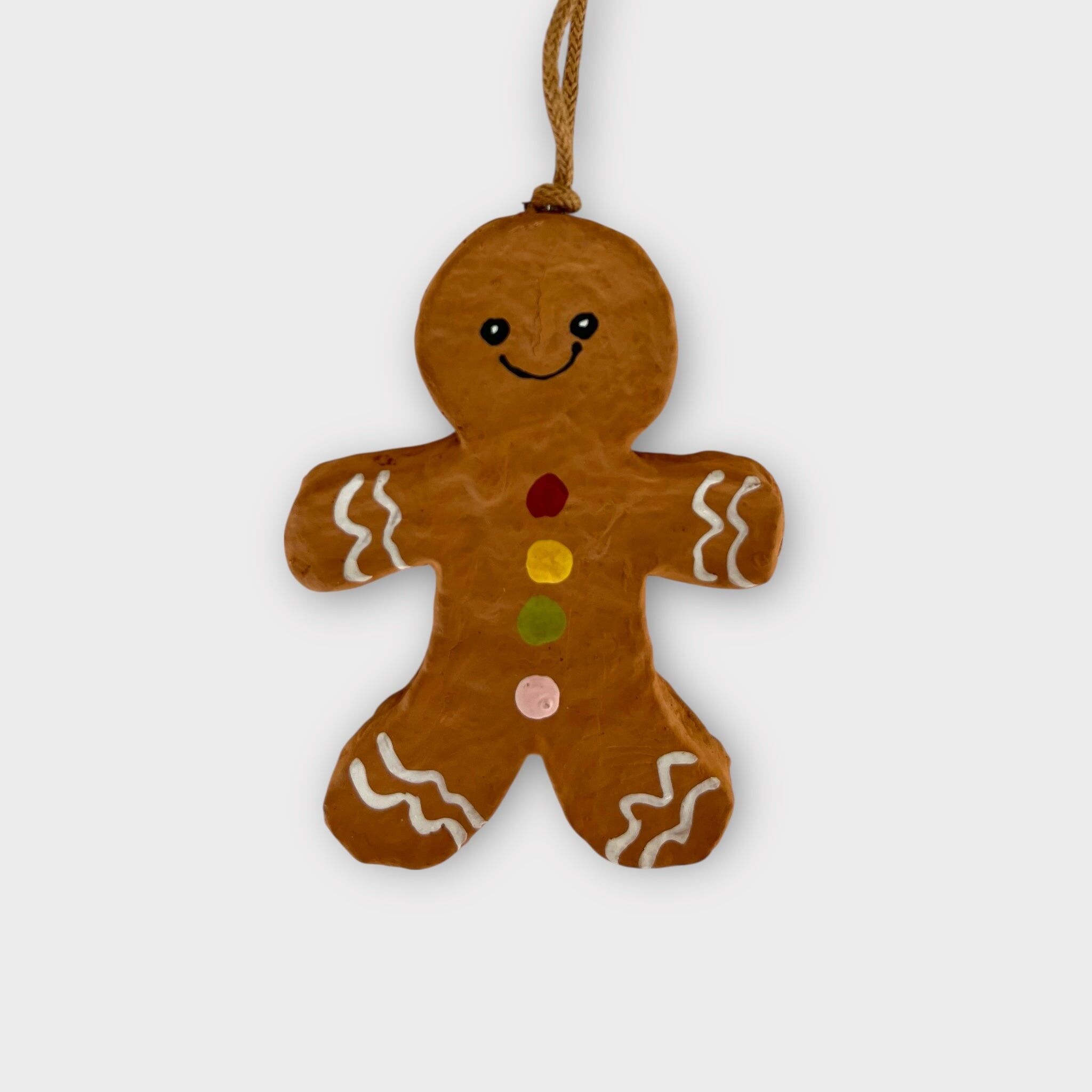 Bonhomme en pain d'épice, boutons en bonbon