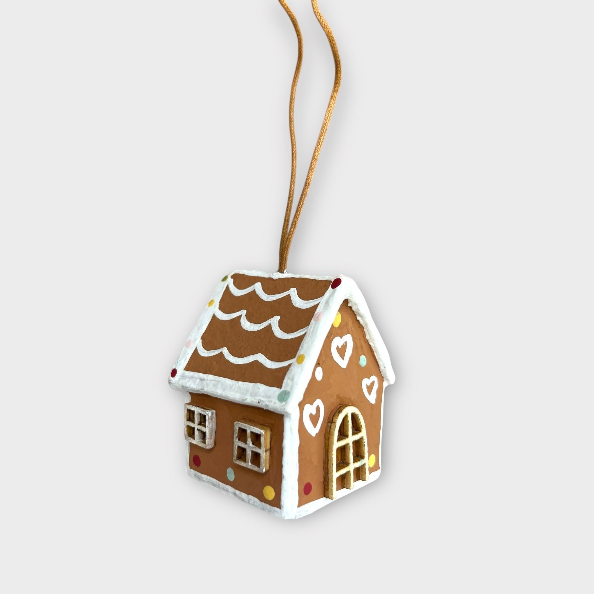 Maison en pain d'épice, boutons en bonbon