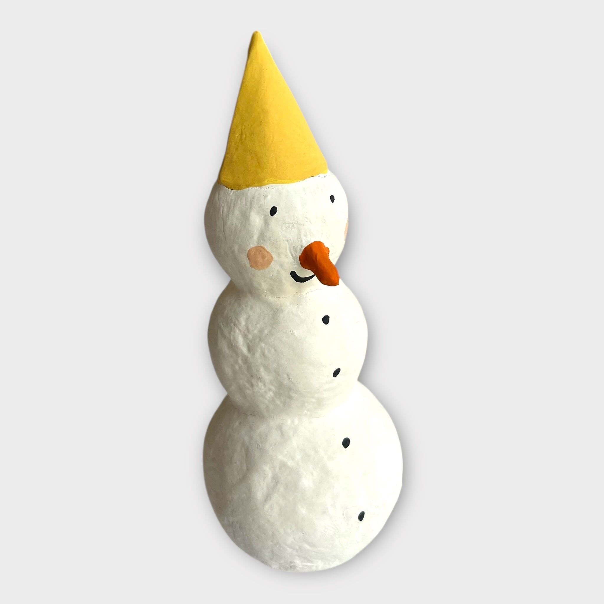 Bonhomme de neige, chapeau jaune moutarde
