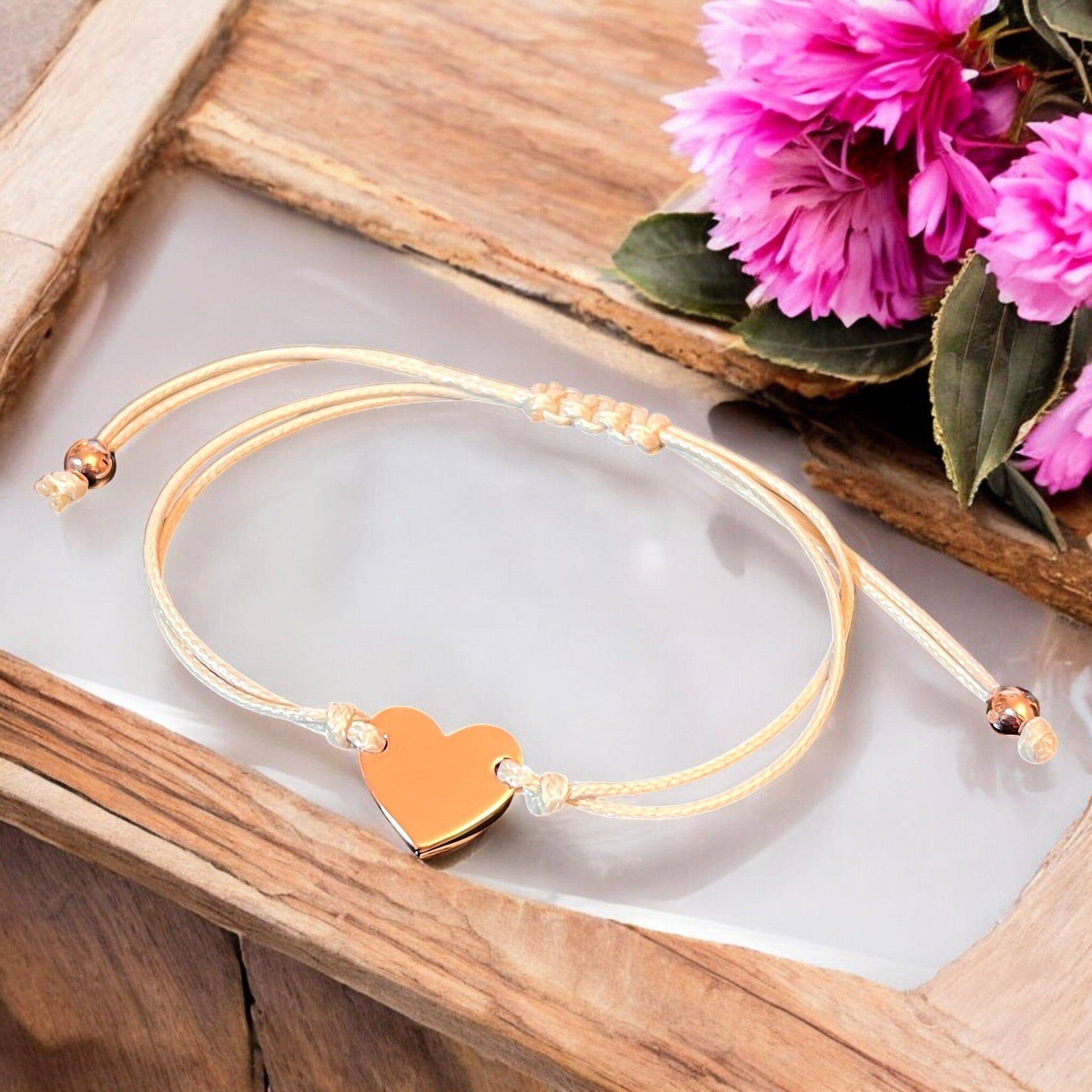 Bracciale "AMOR", cordino beige, cuore regolabile in oro rosa