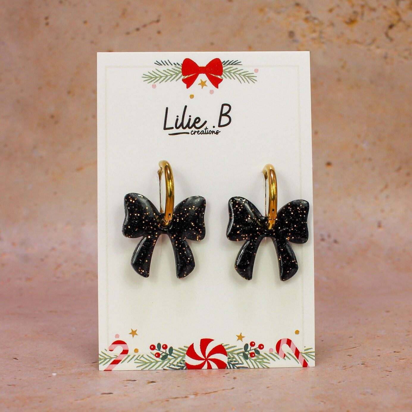 Boucles d'oreilles Pampilles Noeud noir et or