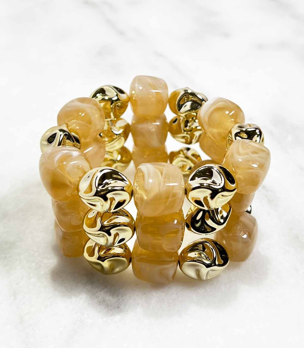 Bracciale tubolare in acrilico su elastico - Beige oro