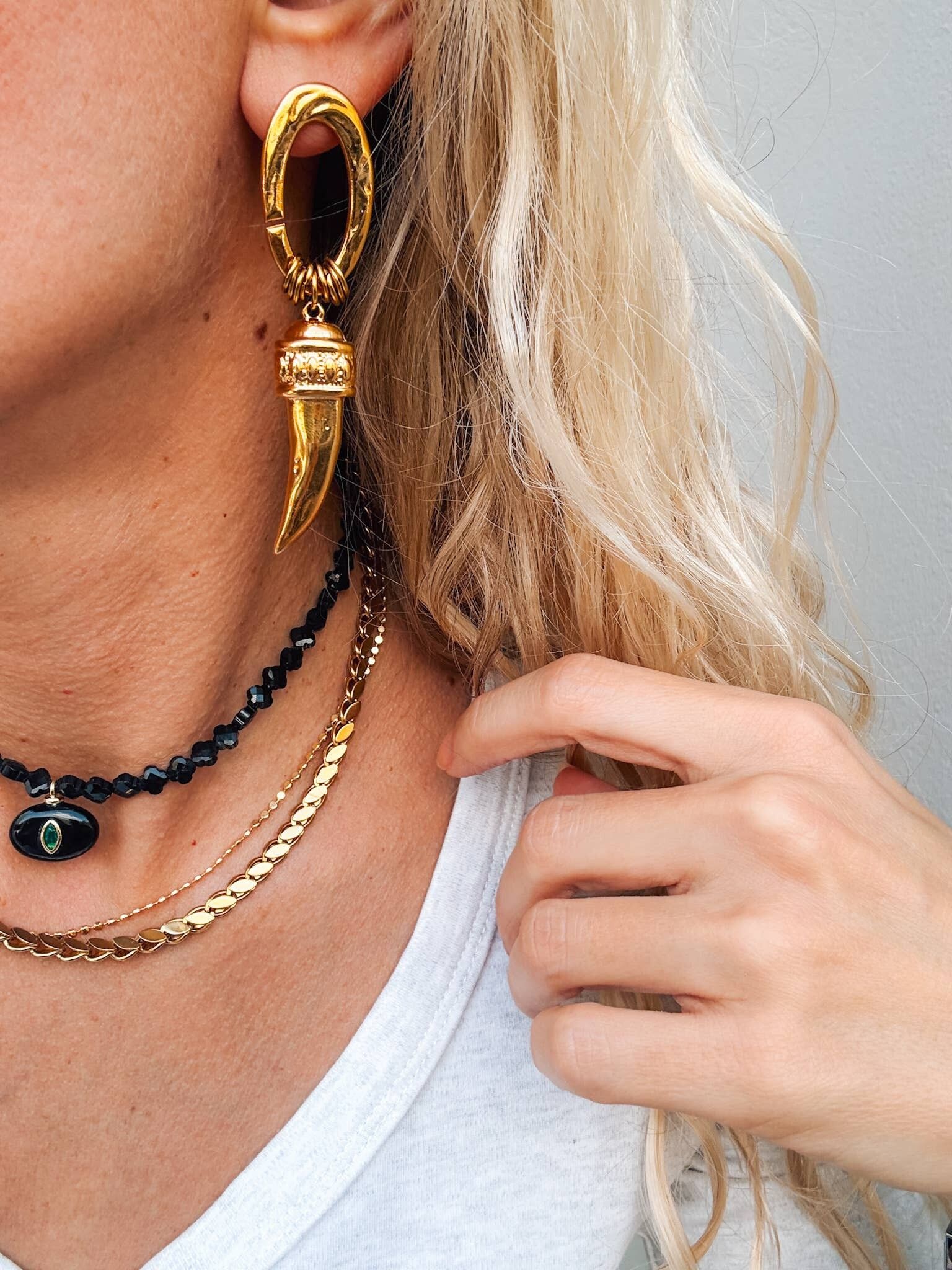 Pendientes de araña de roca con cuerno de plata y oro