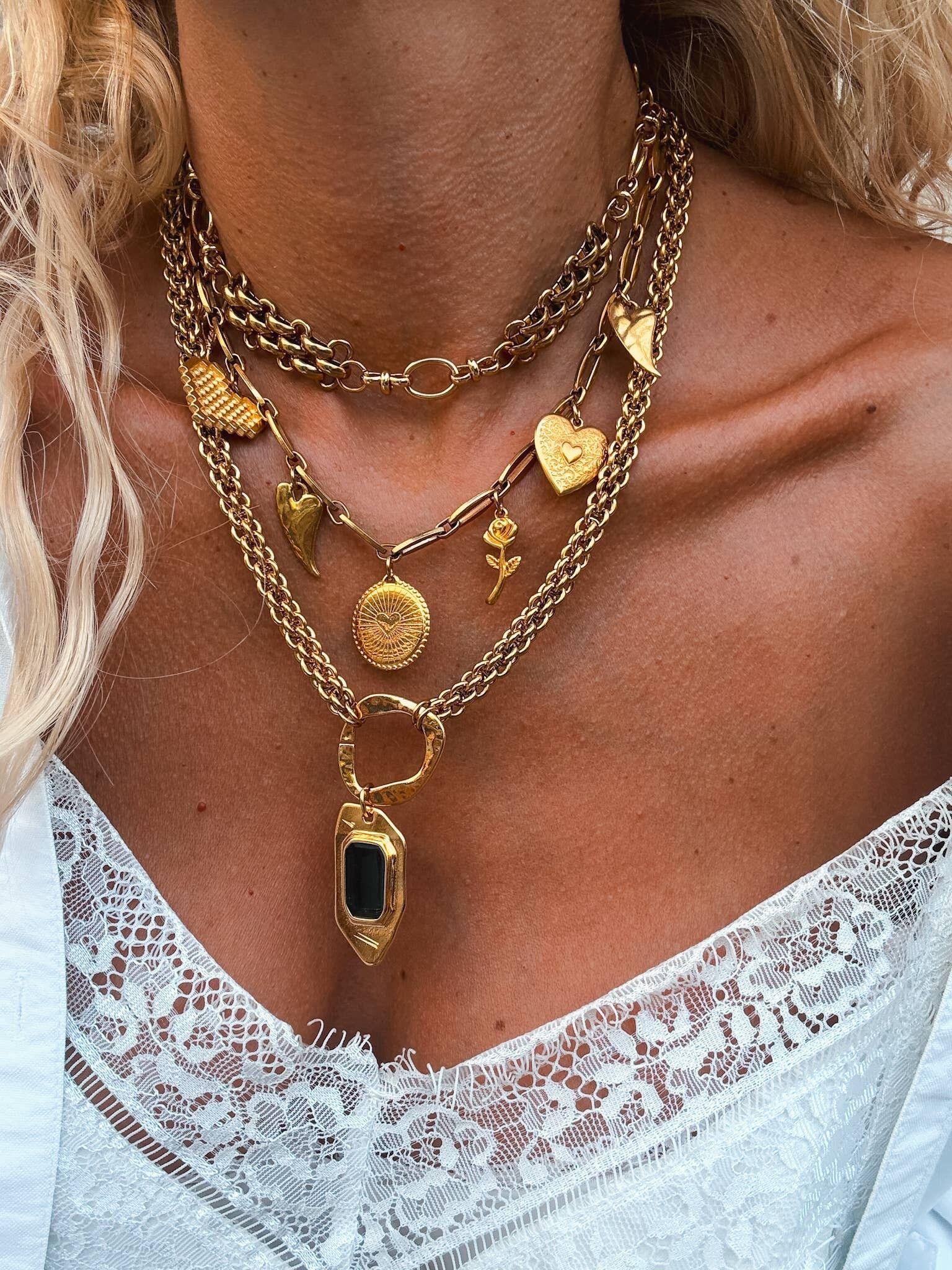 Statement gold charm necklaces with chunky chains