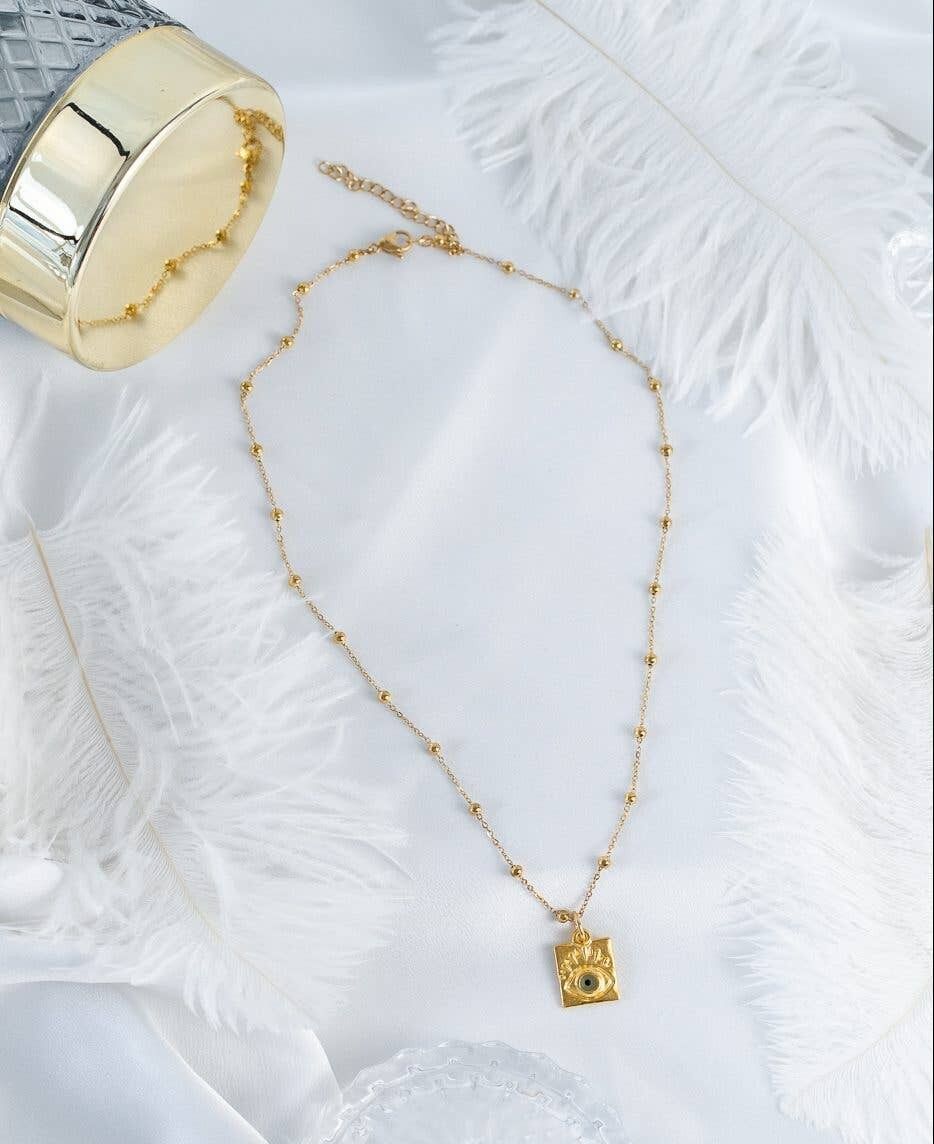 Collier avec étiquette de protection contre le mauvais œil