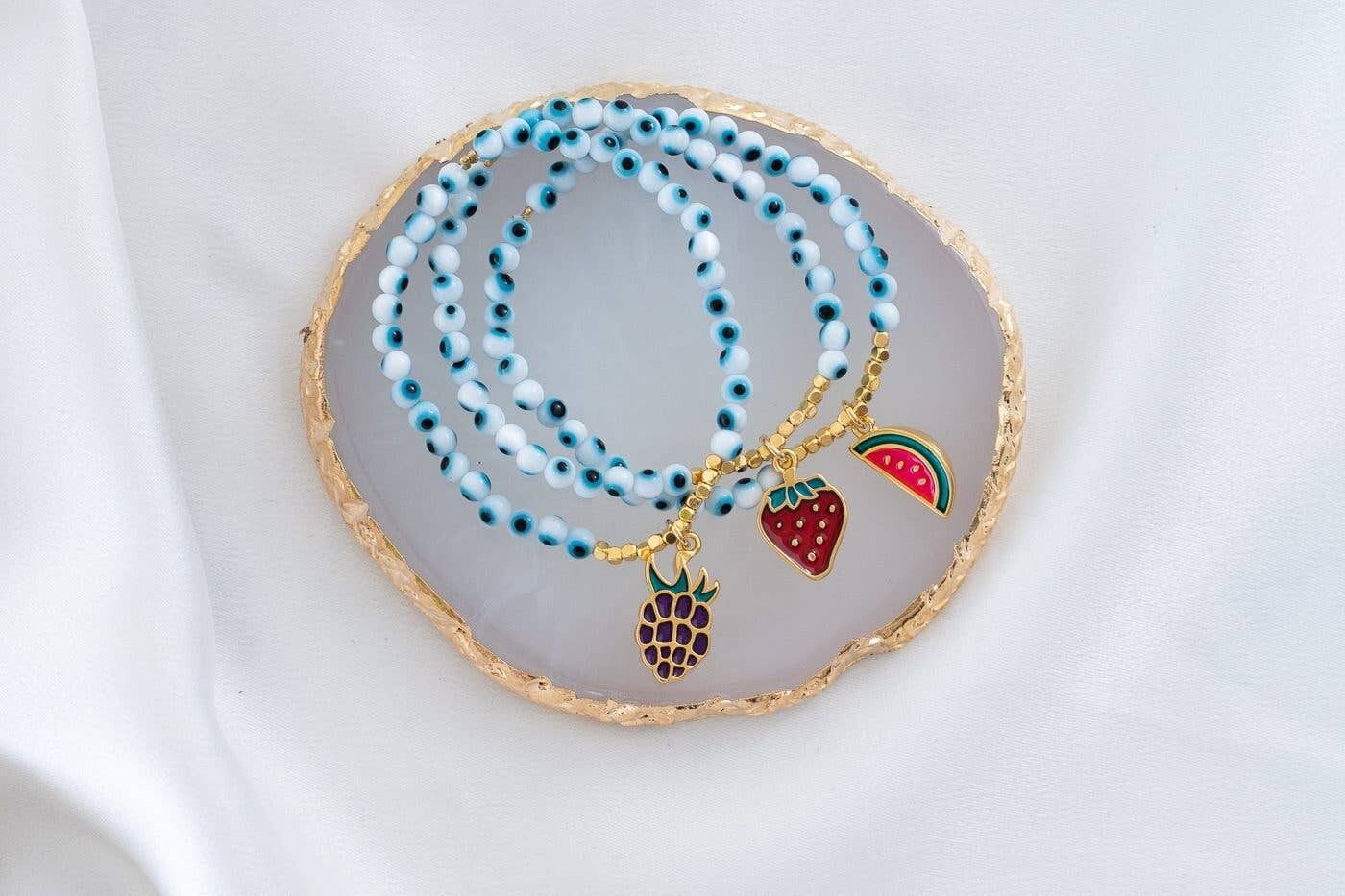 Petits bracelets de fruits mauvais œil