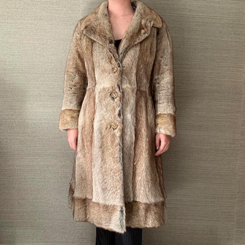 Manteau vintage en fourrure de rat musqué : vêtement d'hiver de luxe des années 70
