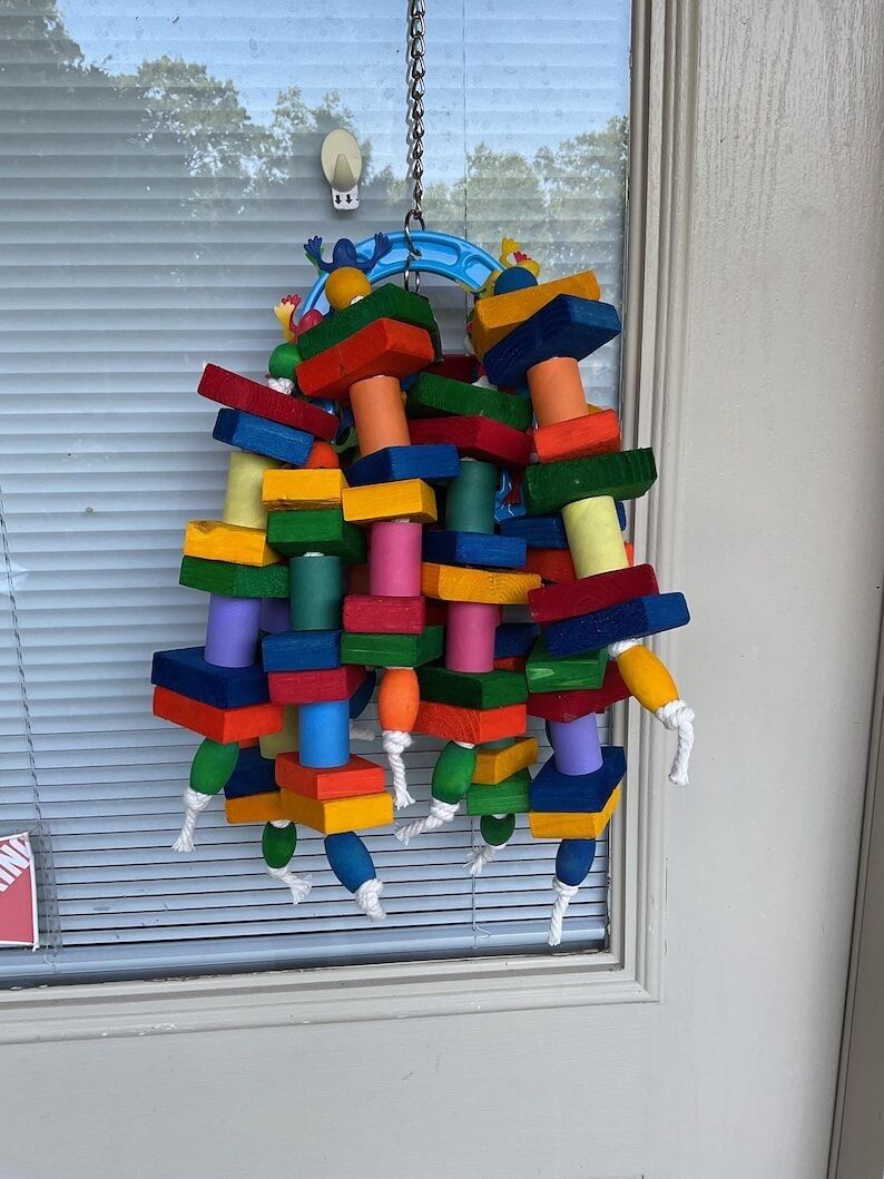 JOUET FER À CHEVAL POUR PERROQUET