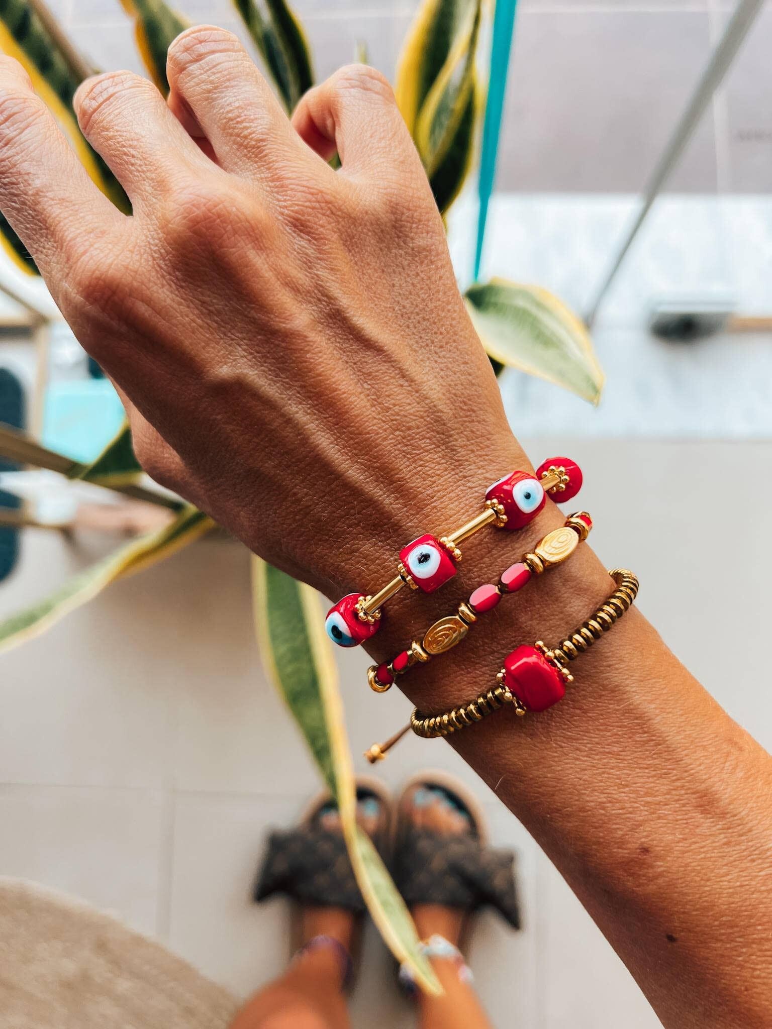 Red and gold detail beaded bracelets