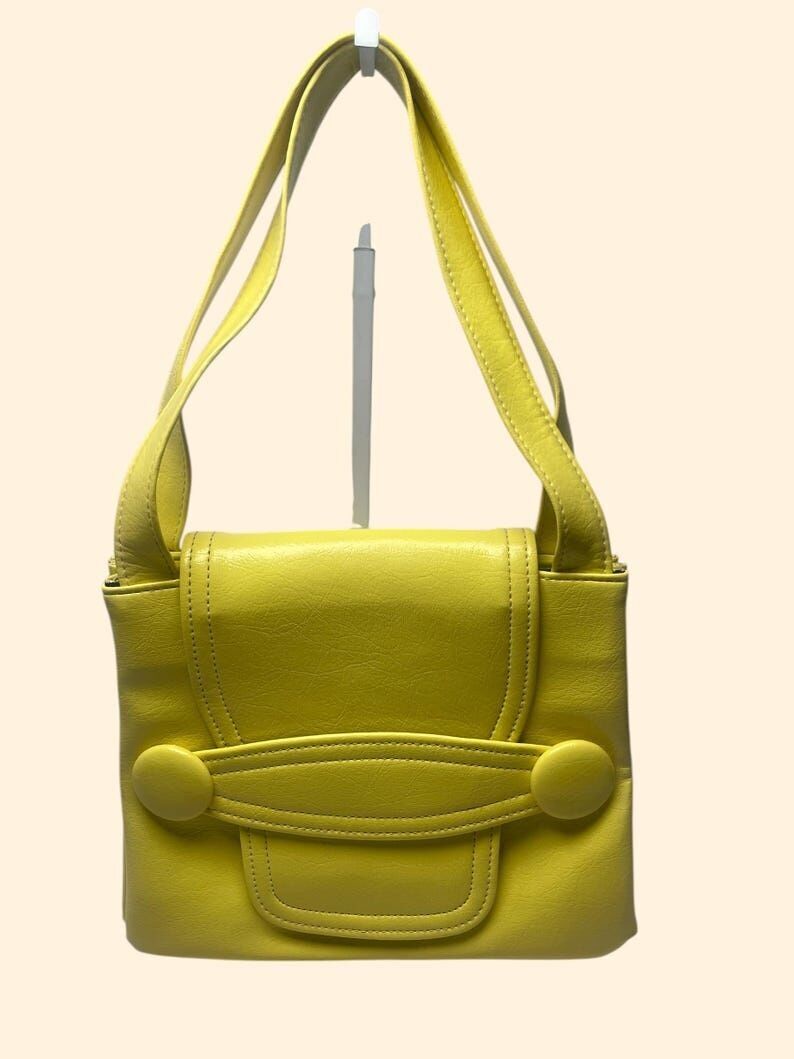 Sac à main jaune vintage années 1960, style Mod, structuré, bandoulière, avec détail de bouton surdimensionné