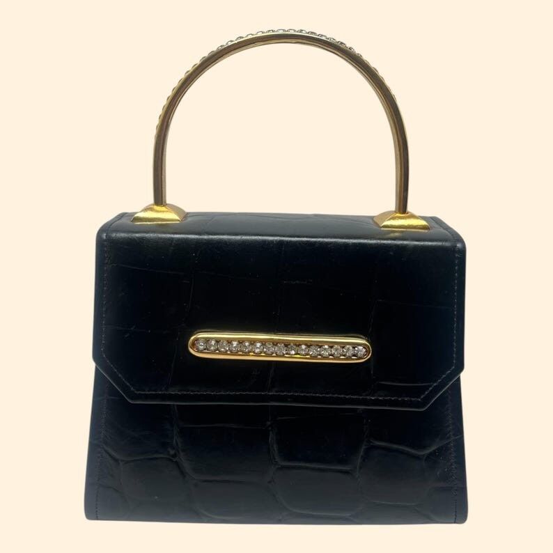 Leatherock Vintage Abendhandtasche aus schwarzem, geprägtem Krokodilleder mit Strassgriffen und goldfarbenen Beschlägen.