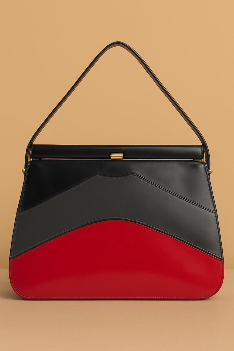 Vintage Miss America Handtasche von Smartaire aus den 1960er Jahren, Colorblock-Vinyl, schwarz-rot, goldener Verschluss, strukturierter Tragegriff