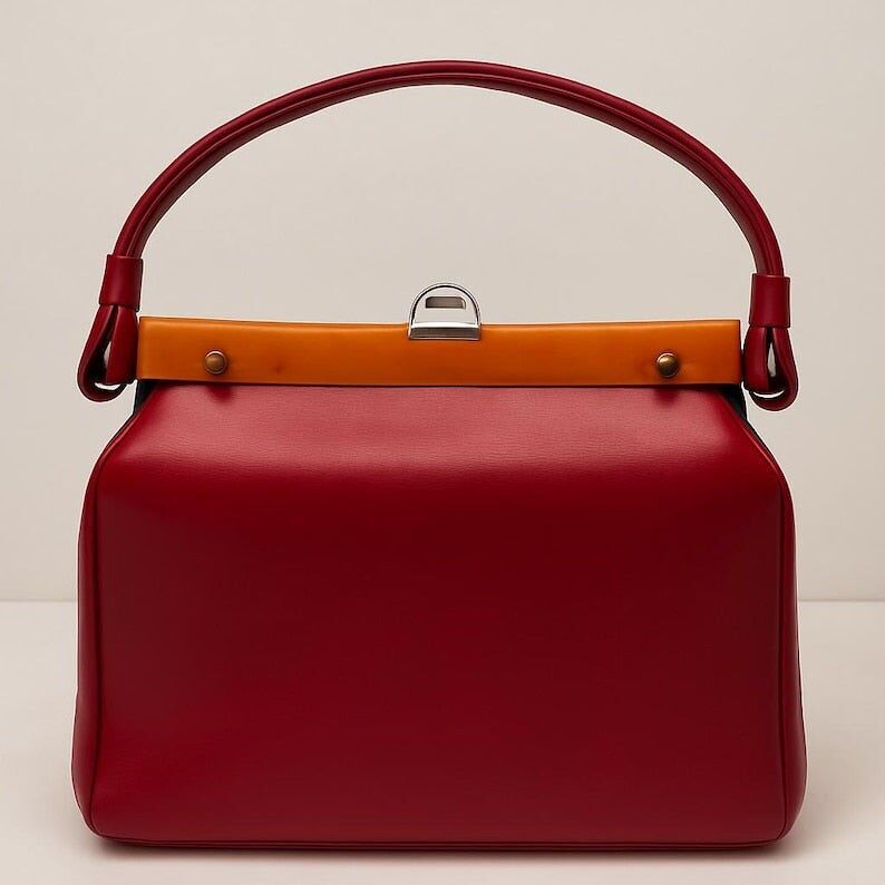 Dover Vintage Handtasche aus den 1960er Jahren, rot, bernsteinfarben, aus Lucite, mit Bar-Top-Henkel und strukturiertem Rahmen