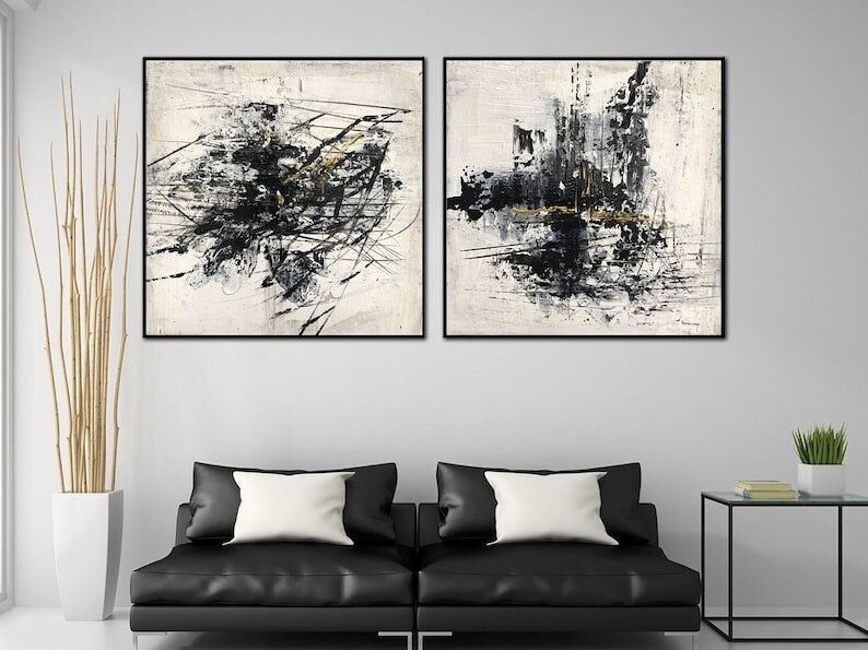 Grand diptyque abstrait : toile texturée noire, blanche et dorée