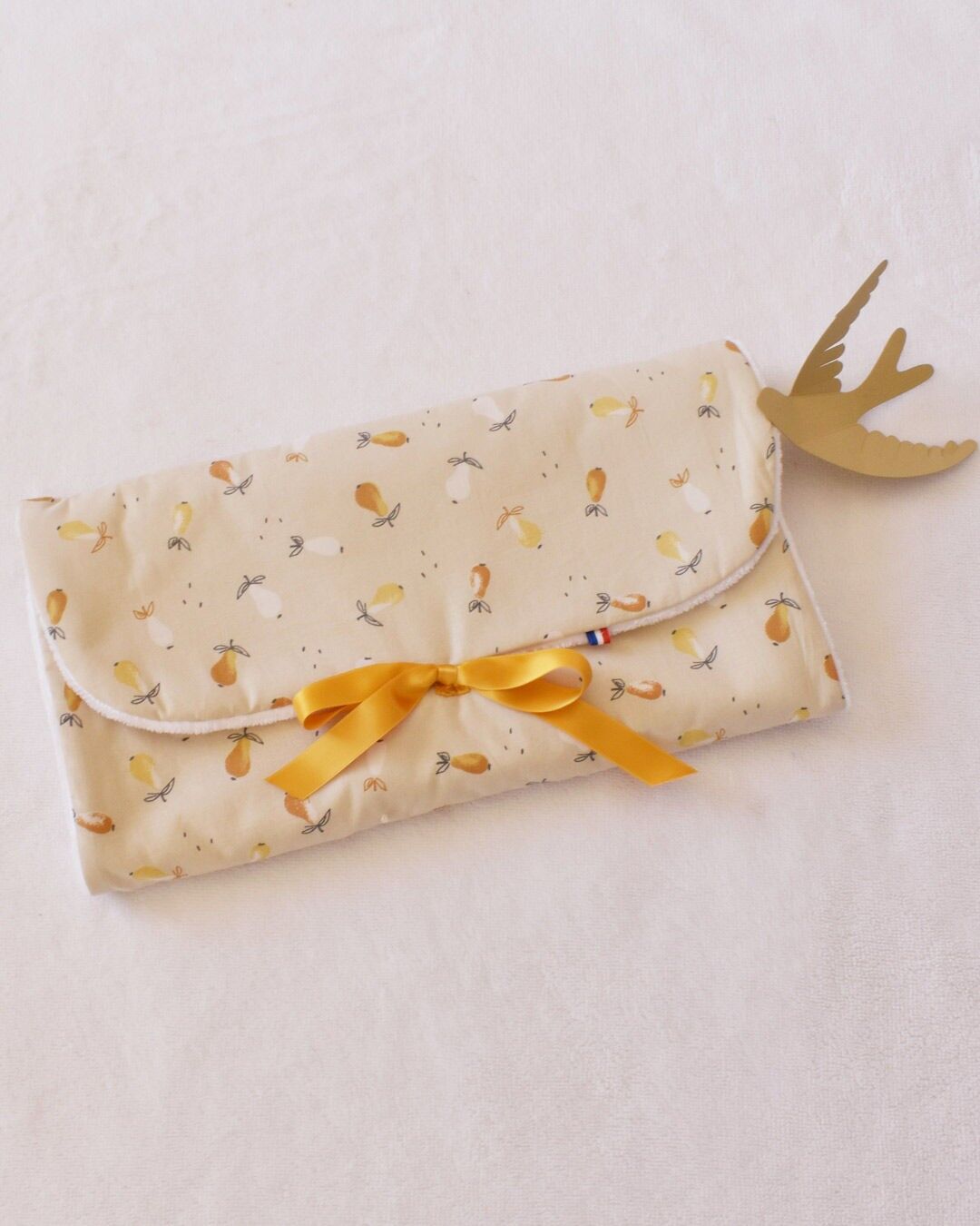 Pear-shaped portable changing mat