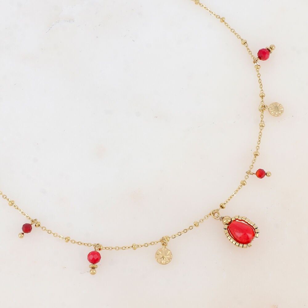 Two-strand necklace with hammered round tassels and natural stones