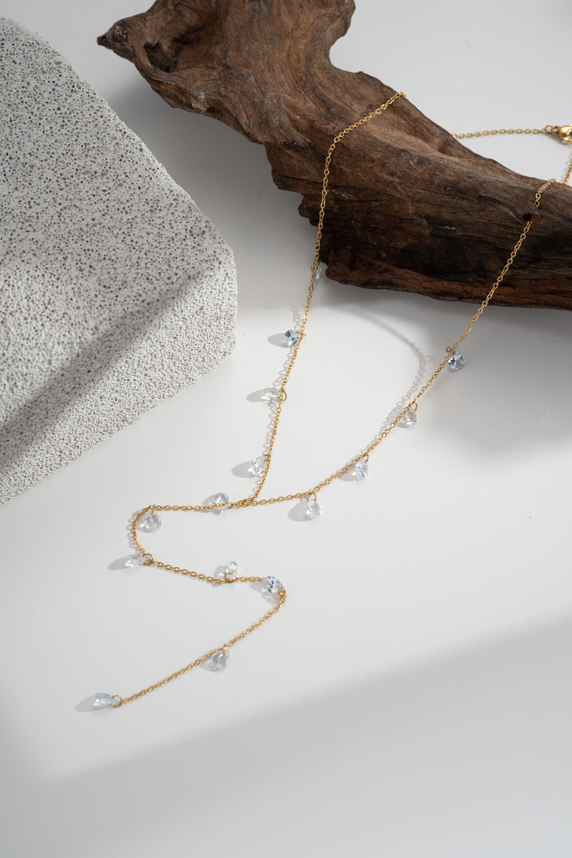 Gold-tone stainless steel necklace with crystal drop pendants