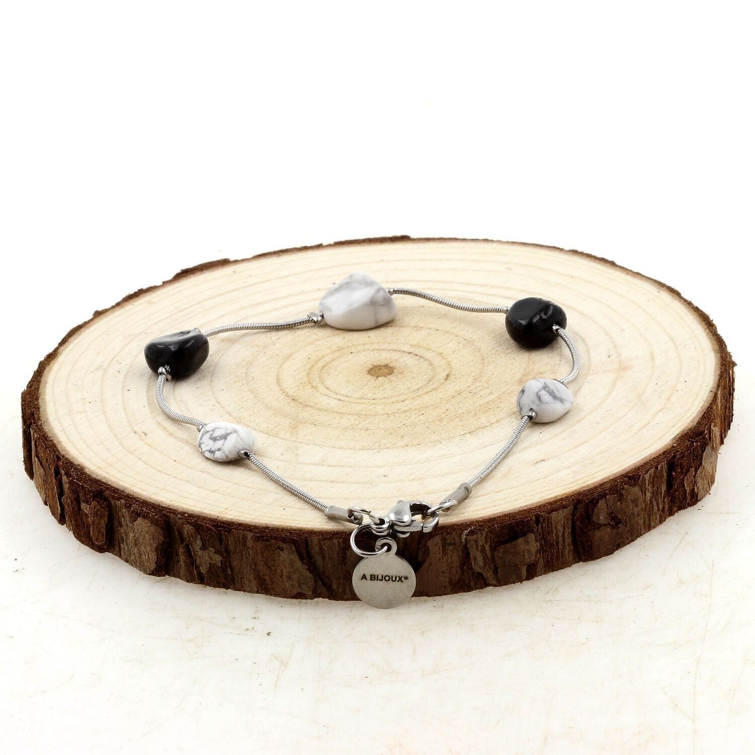 Bracciale in acciaio inossidabile con 5 perle di tormalina Schorl dal Brasile + Howlite dagli USA. Fatto in Francia