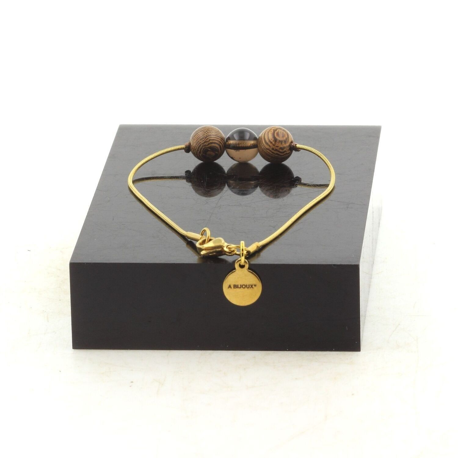 Vergoldetes Edelstahlarmband mit 1 rauchigem brasilianischem Quarzperlenanhänger + 8 mm Holzanhänger. Hergestellt in Frankreich