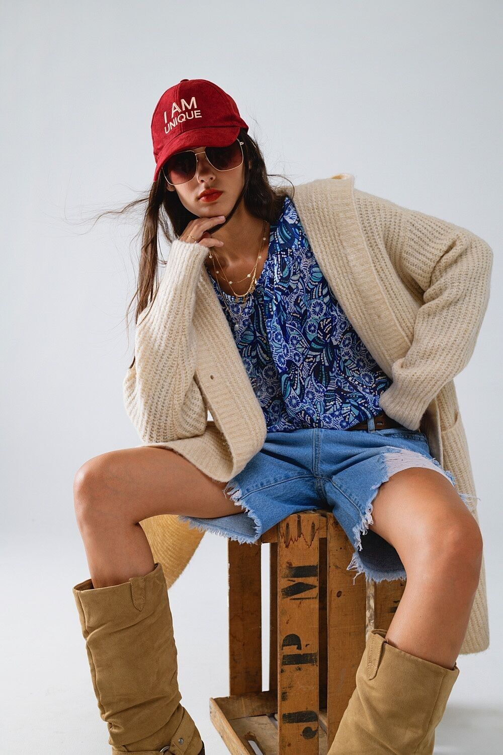 Langer gerippter Cardigan mit Taschen und Kapuze in Creme