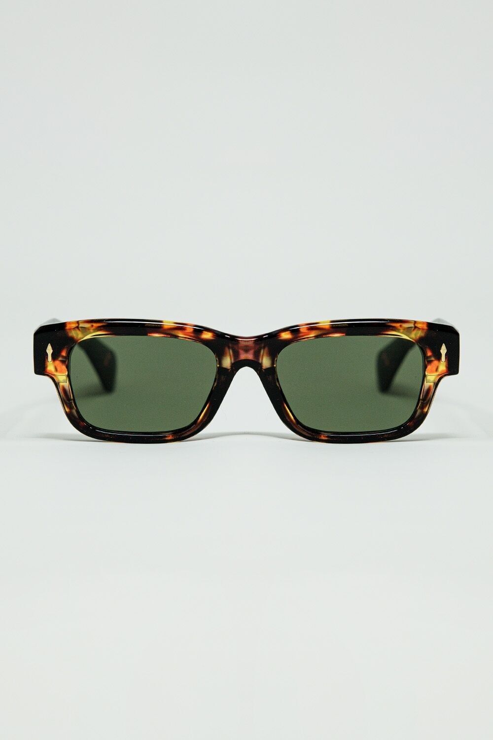 Occhiali da sole ambra con lenti ovali verde scuro