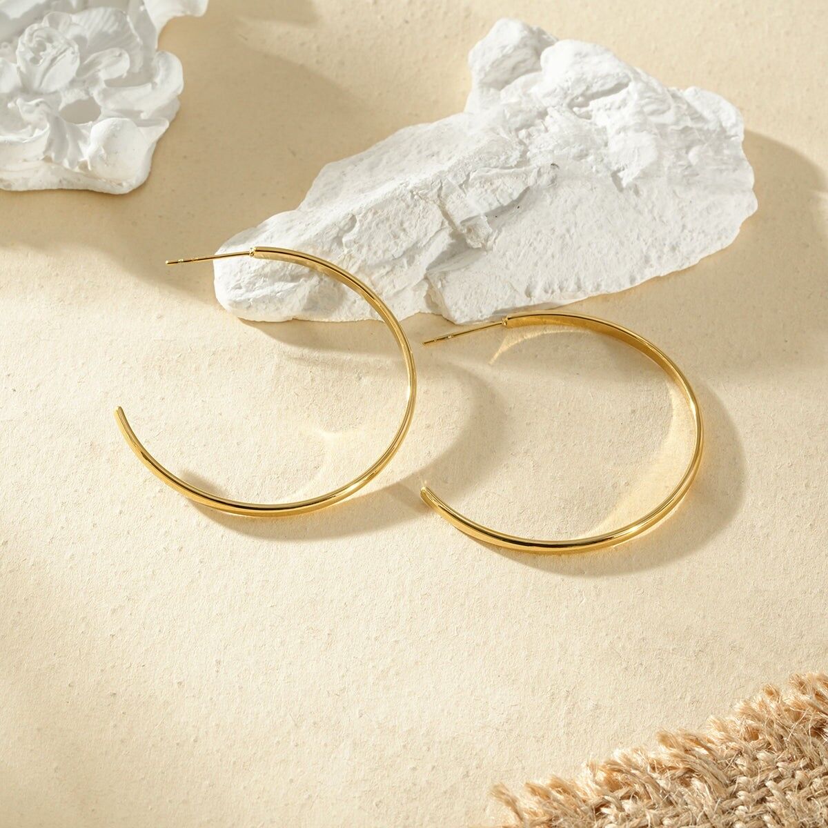 Orecchini a cerchio aperti rotondi in oro