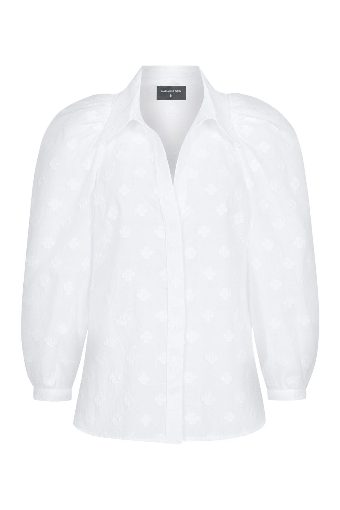 Blusa con flores tejidas