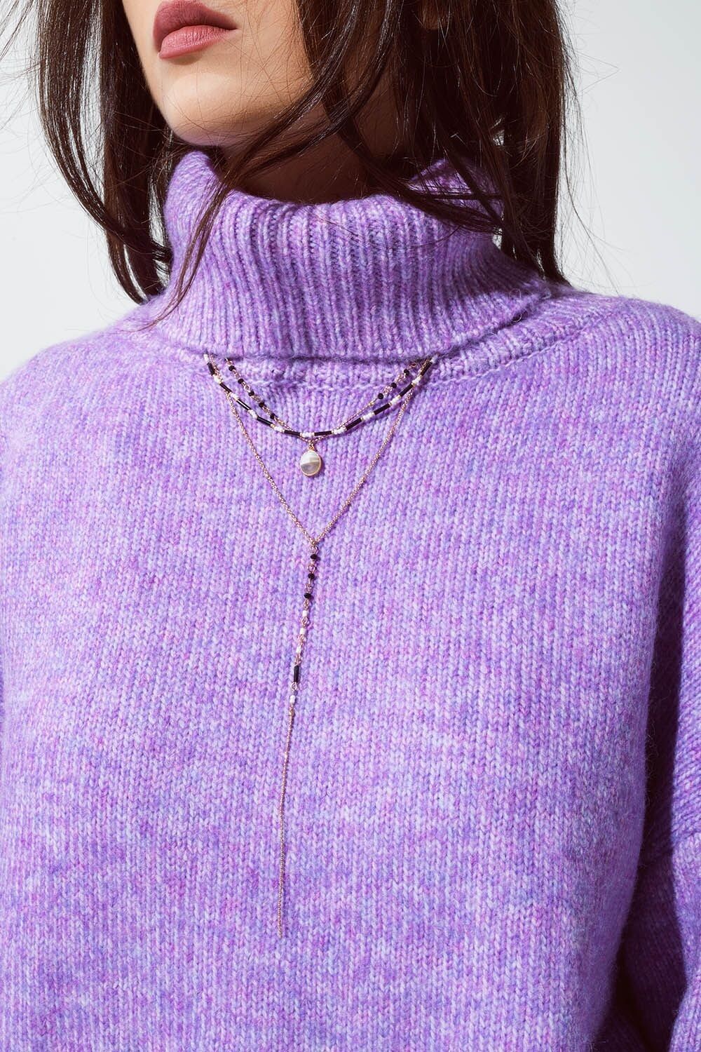 Collar 4 en 1 de oro con cuentas blancas y negras