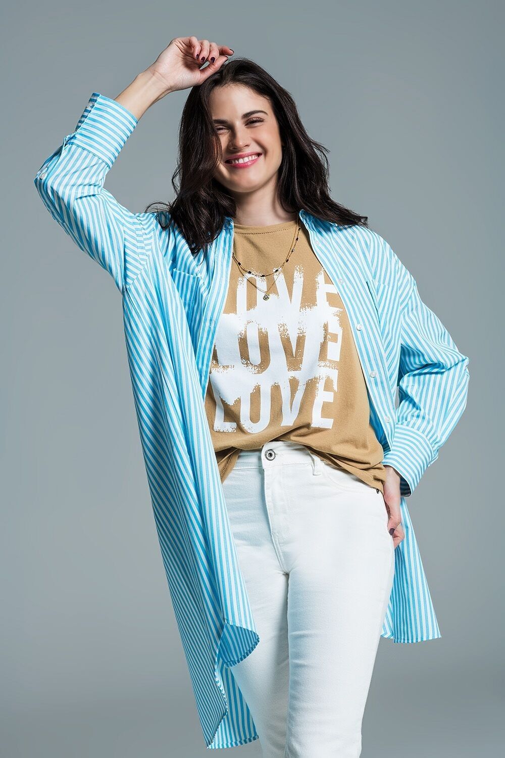 Blusa oversize azzurra con righe bianche