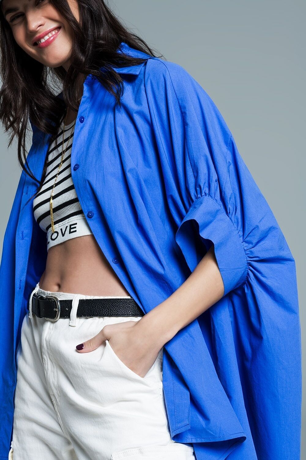 Blusa oversize blu con maniche corte