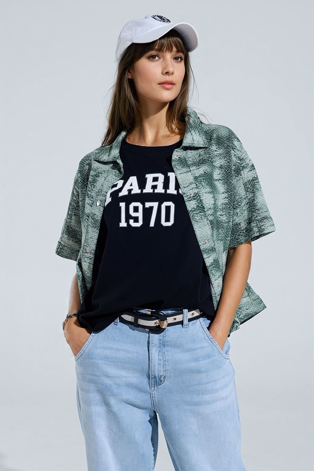 Polo con bottoni in verde tie-dye