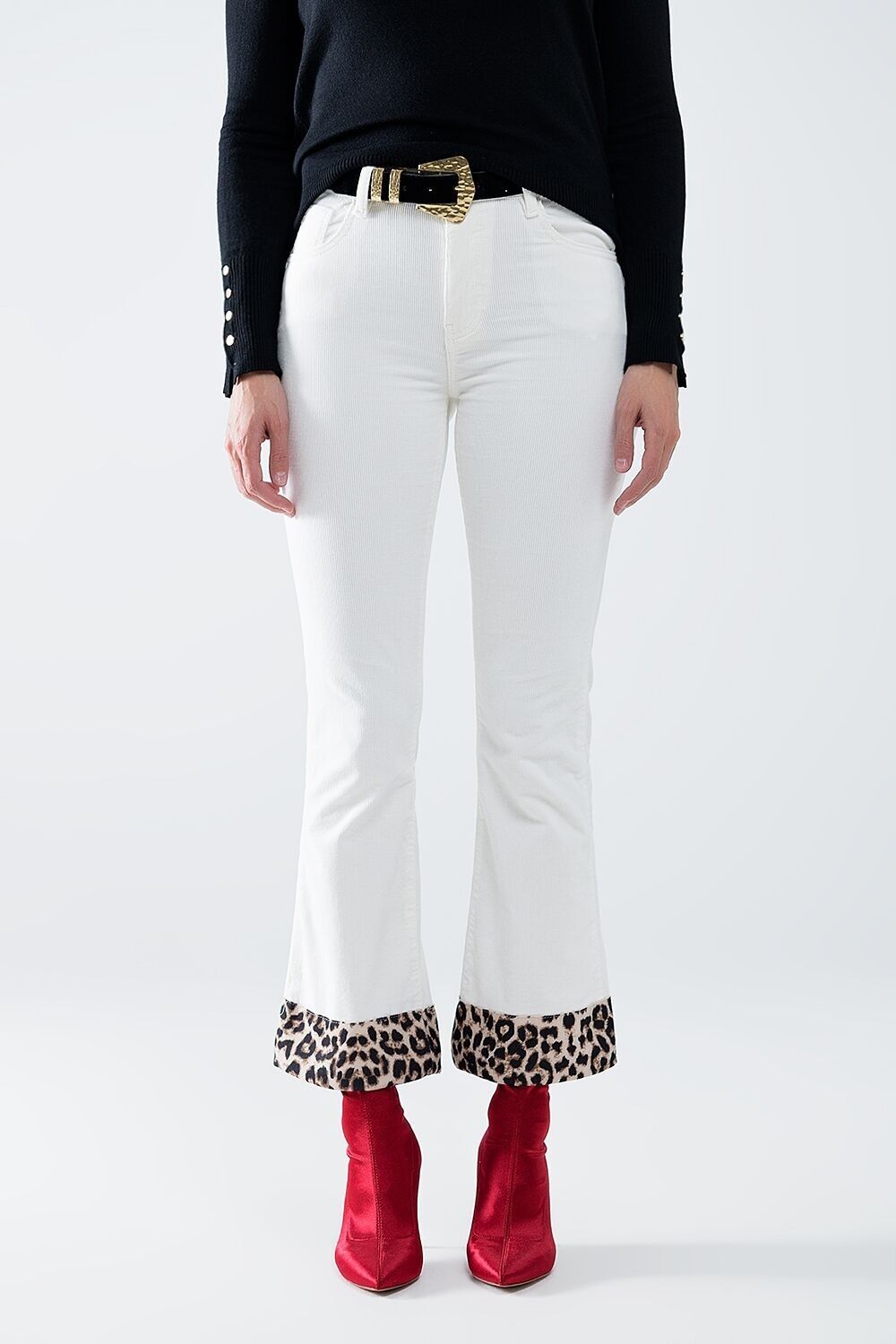 Pantaloni svasati in velluto a coste color crema con stampa leopardata sul fondo