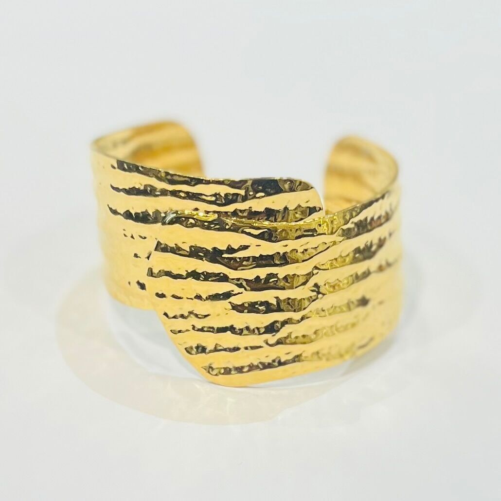 Wide, asymmetrical hammered-effect steel cuff bracelet
