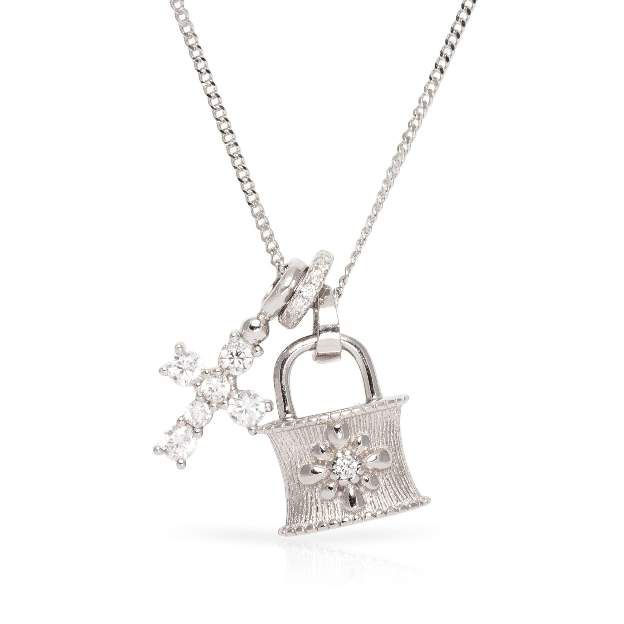 Collana in argento sterling 925 con piccolo pendente a croce in zircone e chiusura a molla.Colore: argento
