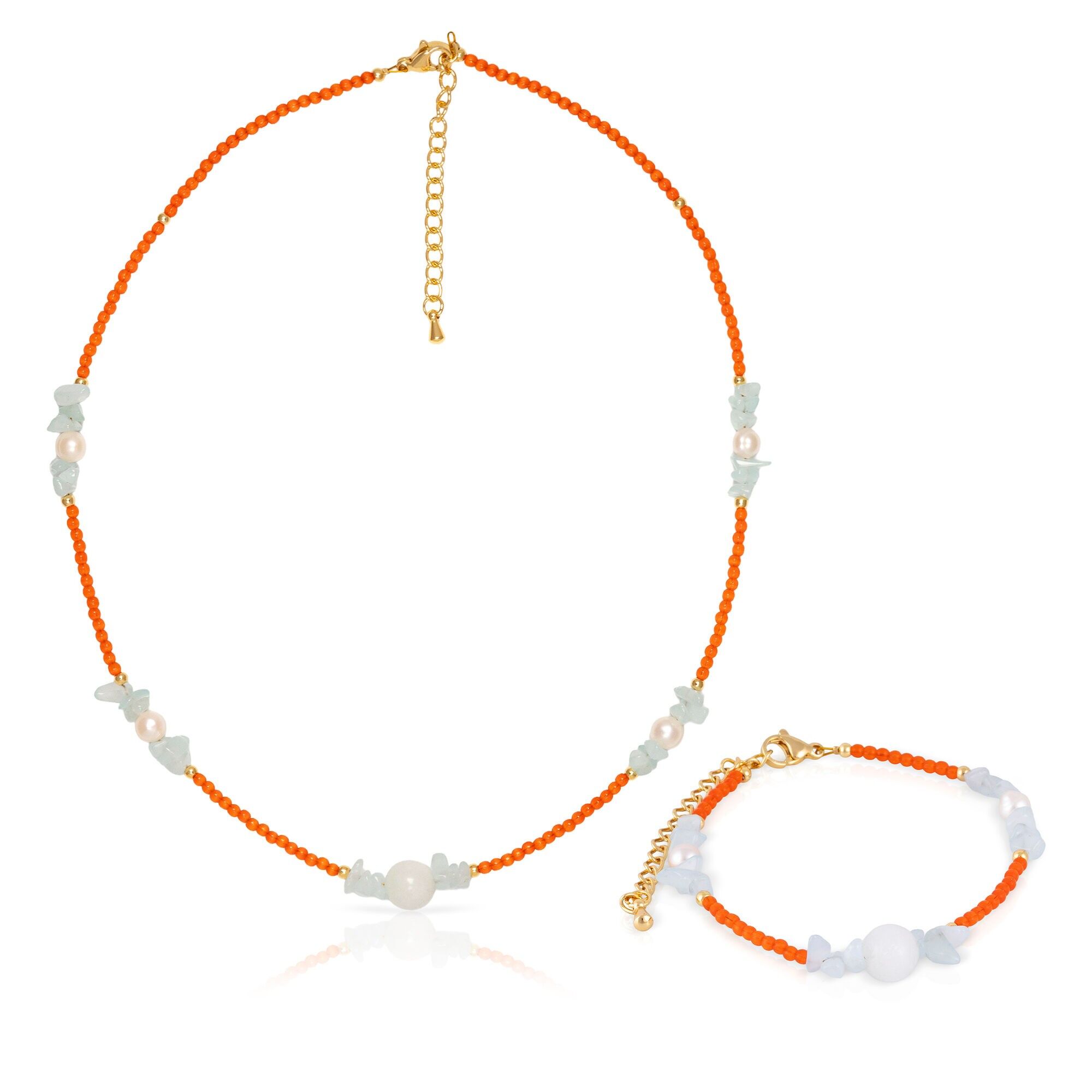 Set composto da bracciale e collana coordinati in occhio di gatto arancione, lapislazzuli chiaro, marmo bianco e perle naturali con chiusura a moschettone. Colore:Multicolore