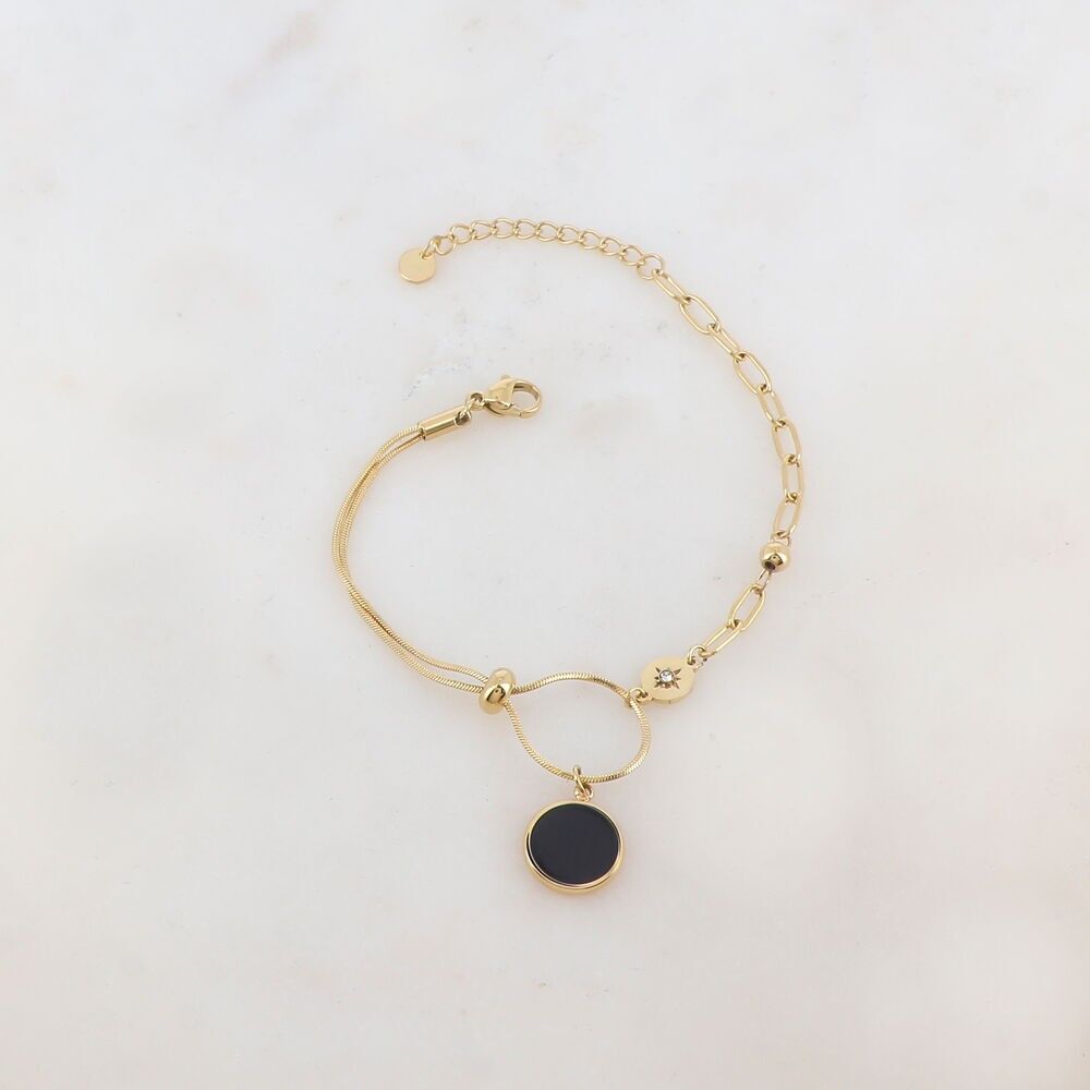 Mesh bracelet with round enameled piece, rhinestone, star, small bead