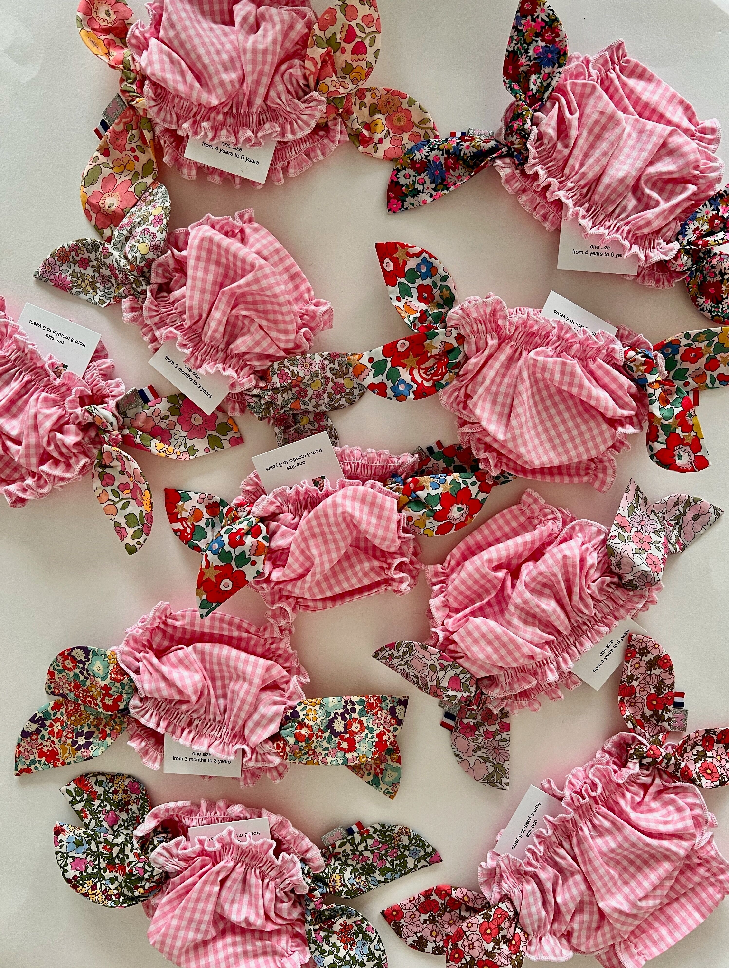 Set mit 10 rosafarbenen Badeanzügen mit Vichy-Karo und Liberty-Muster für kleine Mädchen