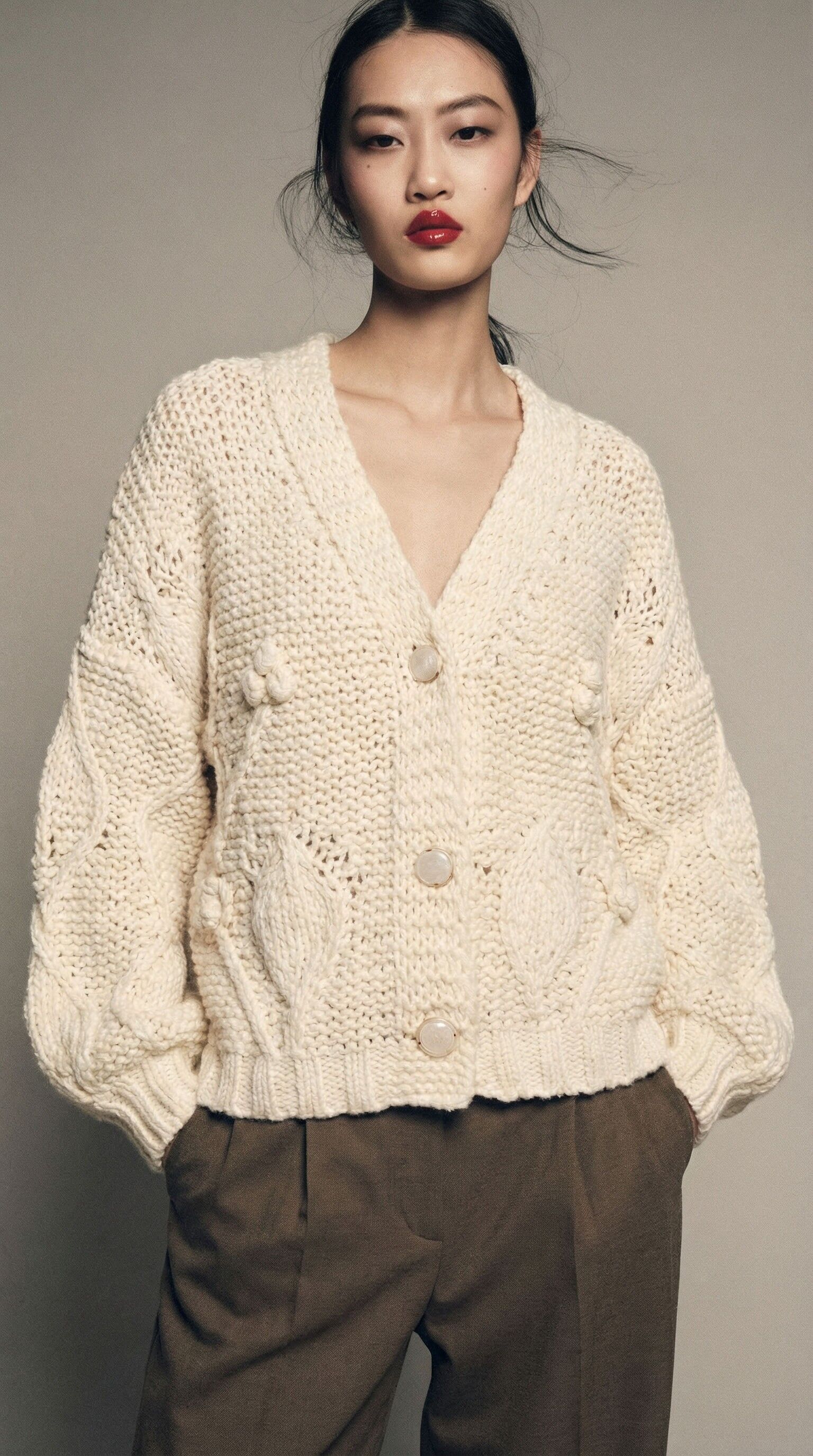 Strickjacke mit Puffärmeln