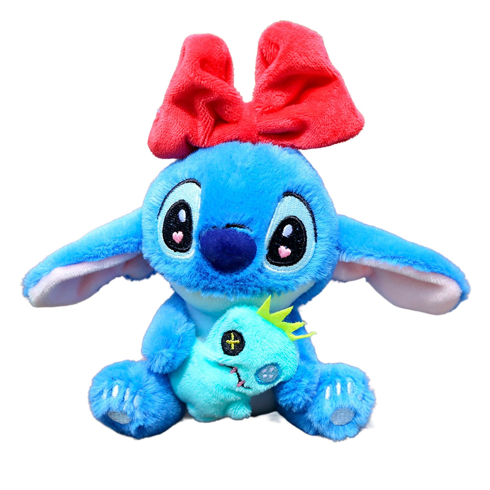 Extra weiches Hängeplüschtier. Kleines Monster-Design mit roter Schleife. 12cm.Farbe: Blau