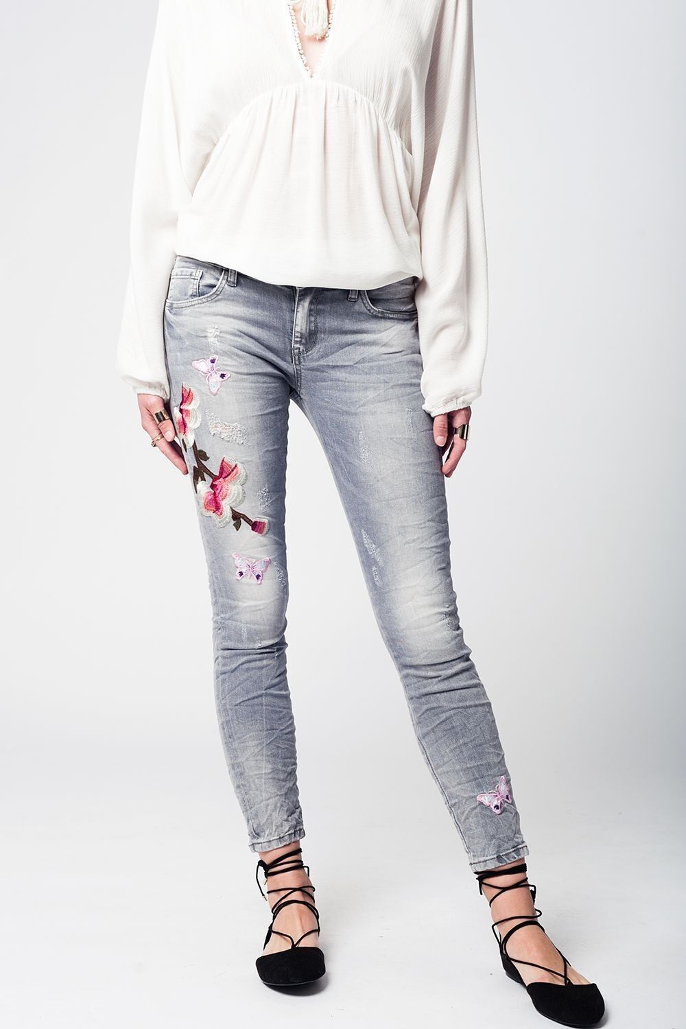 Graue Slim-Denim-Jeans mit Stickerei