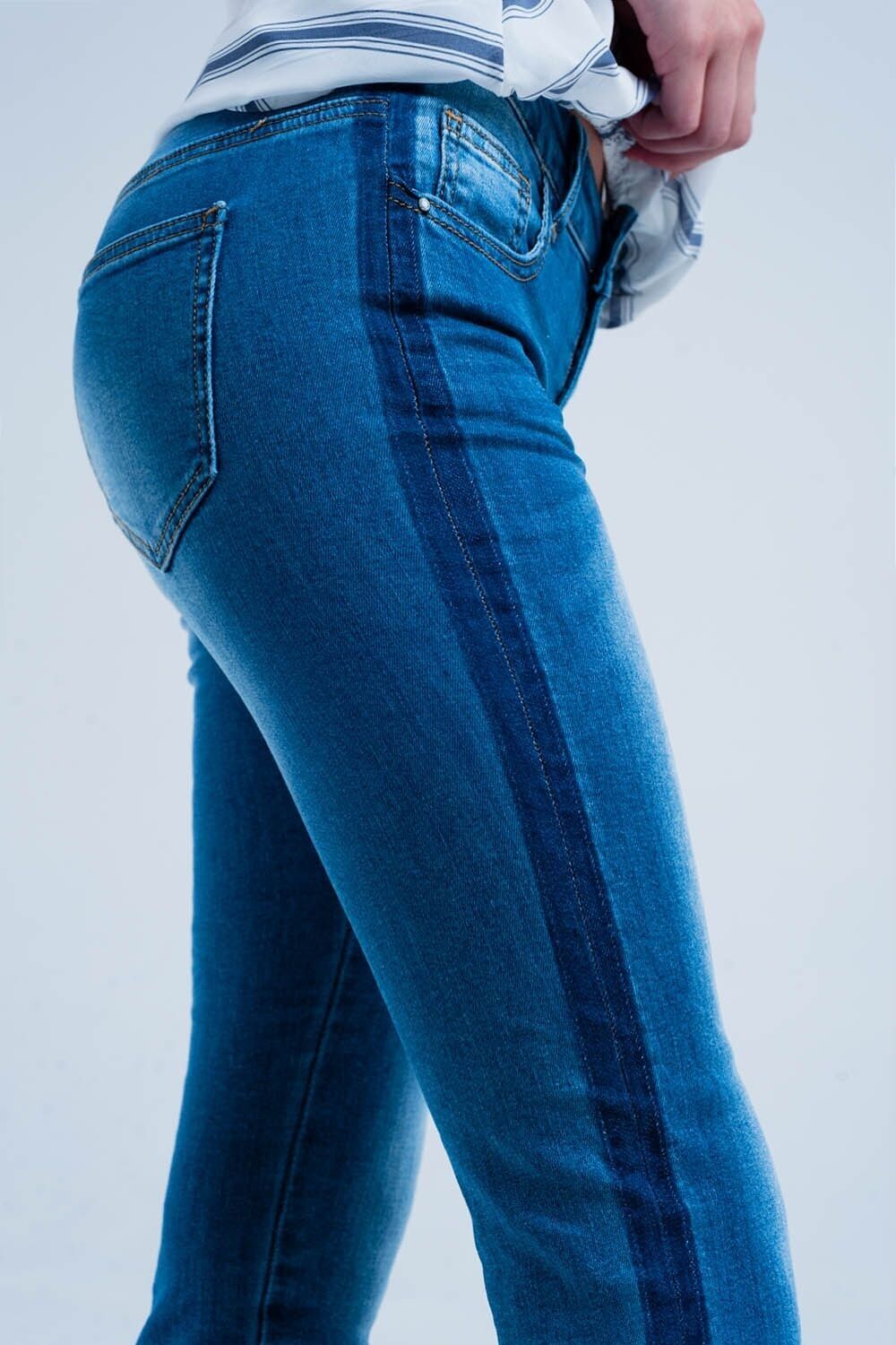 Denim jeans with blue side stripe