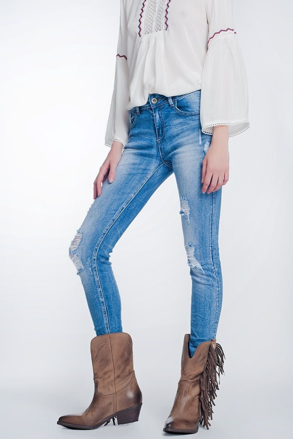 Super-Skinny-Jeans in mittelblauer Vintage-Waschung mit starken Rissen