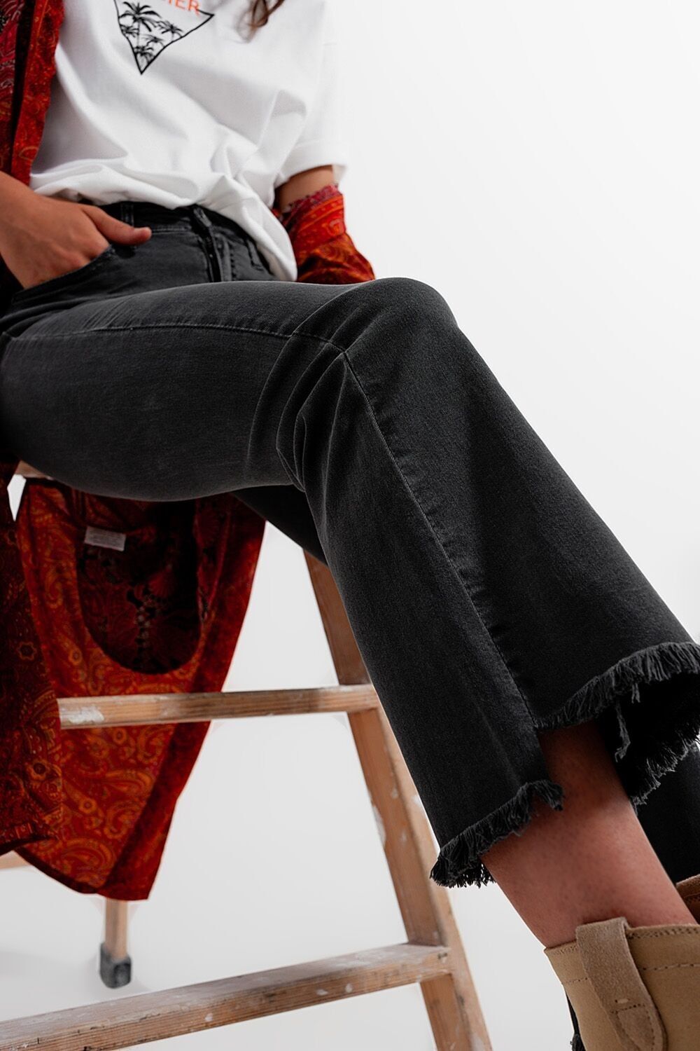 Flare jeans in dark grey with asymmetric detail