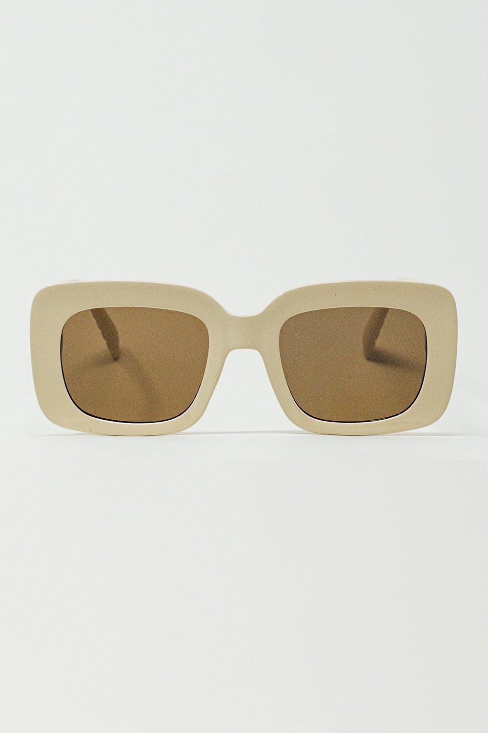 Ovale Sonnenbrille mit rauchfarbenen Gläsern in Beige