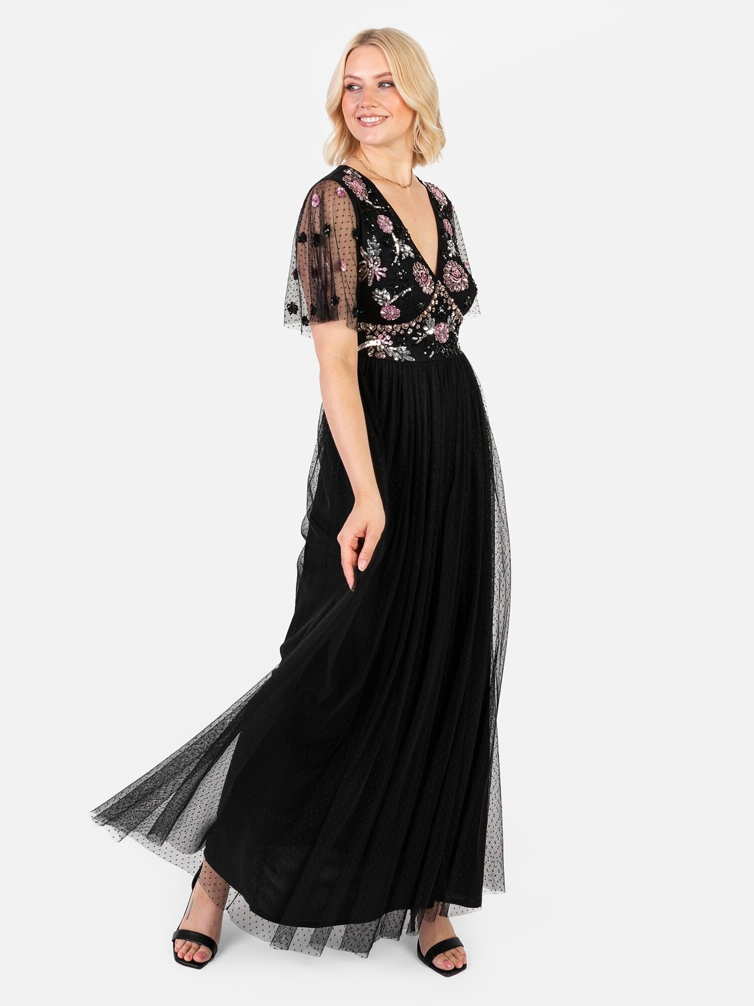 Vestido largo de malla con lunares y adornos florales negros Maya